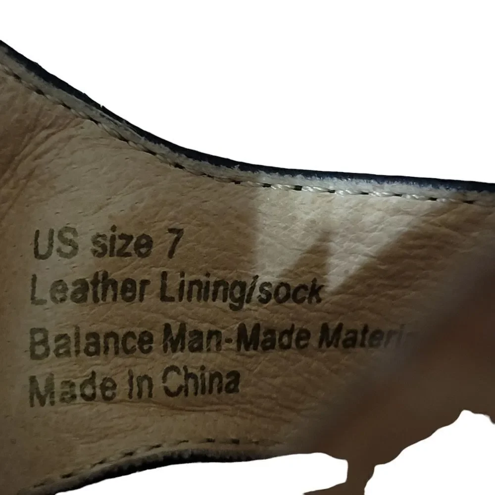 Volatile wedge sandal